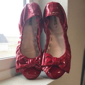 Miu Miu patent leather red flats